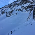 Some skiers making lines on the off-piste of Arcalís