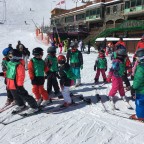 Little skiers getting ready to head to the chairlift
